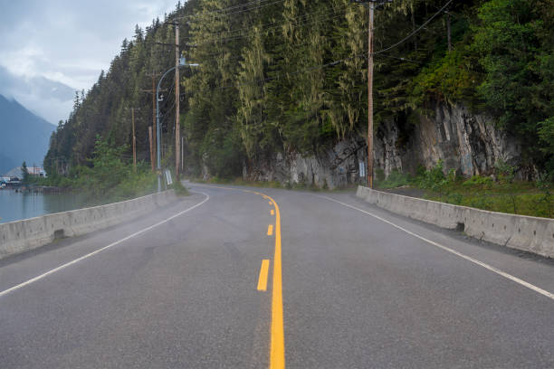 Cassiar Highway landscape with mist between Stewart, Canada and Hyder, Alaska, USA. 300 meters before the Canadian - American border.
