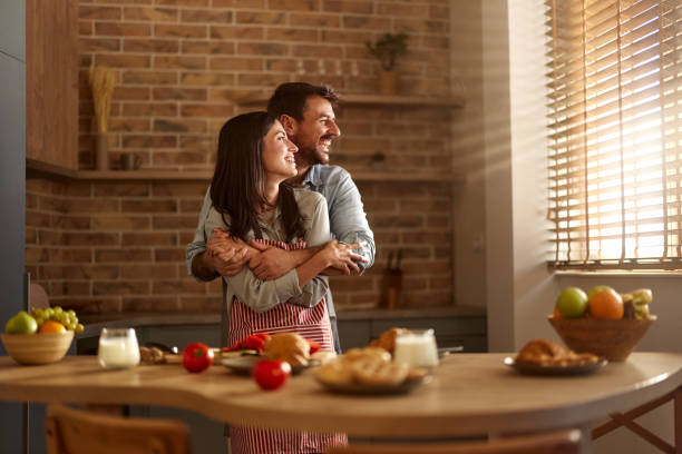 istock Young happy couple enjoying in the kitchen. 2183649868