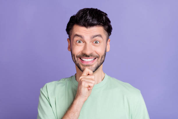 istock Close up photo of impressed cool man arm touch face beaming smile interesting plan project isolated on purple color background 2183653327