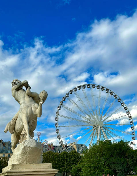 istock Ferris Wheel and Statue in Park in Paris 2183655561