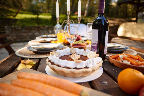 Close up of sweet pie on picnic table in nature.