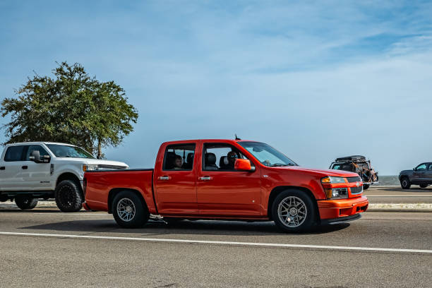 Gulfport, MS - October 04, 2023: Wide angle front corner view of a 2009 Chevrolet Colorado V8 Crew Cab Pickup at a local car show.