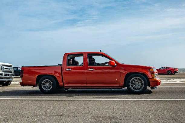 Gulfport, MS - October 04, 2023: Wide angle side view of a 2009 Chevrolet Colorado V8 Crew Cab Pickup at a local car show.