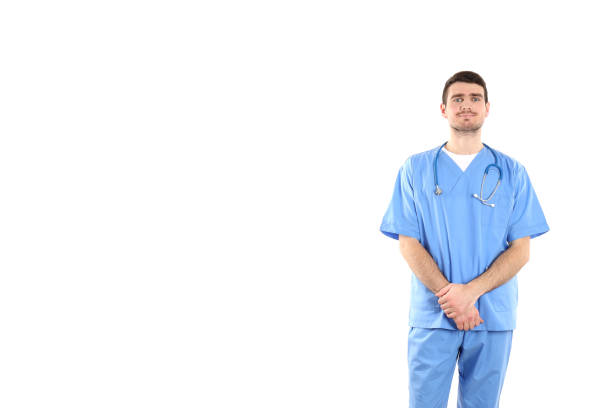 Attractive doctor intern isolated on white background