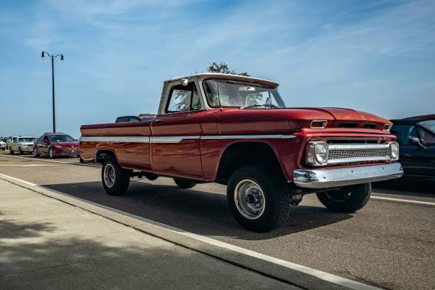 Gulfport, MS - October 04, 2023: Low perspective front corner view of a 1966 Chevrolet C10 Fleetside Pickup Truck at a local car show.