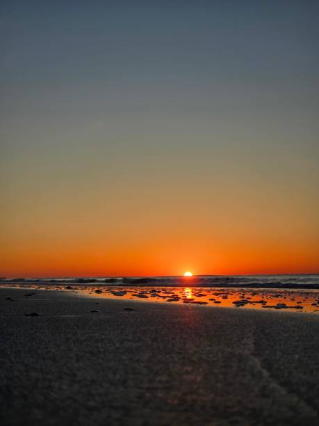 istock Golden Sunrise Over Tranquil Beach 2183658256