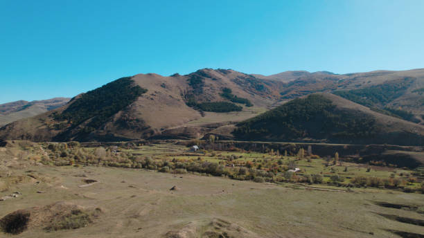 istock Beautiful dense forest on mountains. Lush Dense Forest on Caucasian Mountains. Verdant Forest Landscape in Caucasus Mountains. Beautiful Dense Woodland on Caucasian Slopes. Green Forest on Caucasus Mountain Range. Thick Forest. Aerial Photography. 2183660478