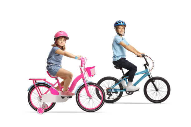 istock Children riding bicycles with helmets 2183663417