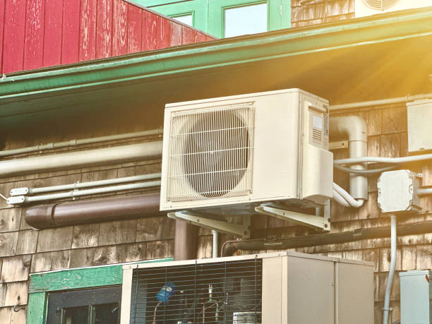 istock Building Exterior With Air Heat Pump 2183674380