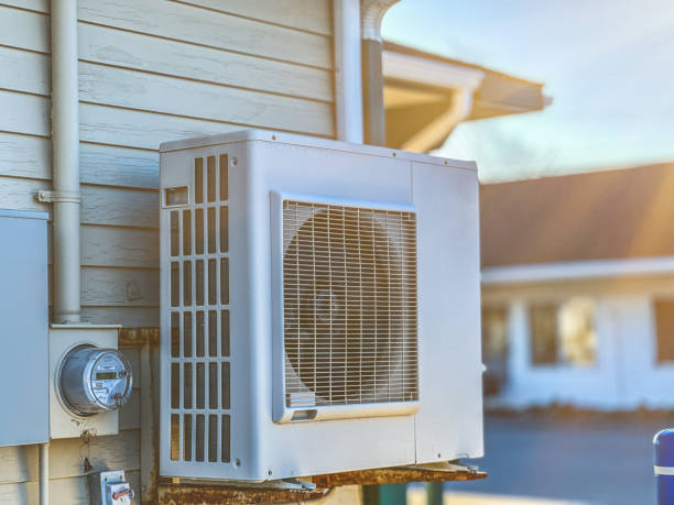 istock Building Exterior With Air Heat Pump 2183674403