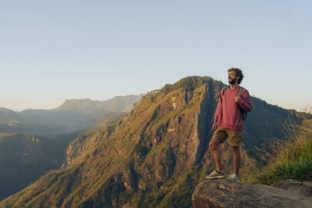 istock Man enjoying  the view from Little  Adam's peak at sunrise 2183678005