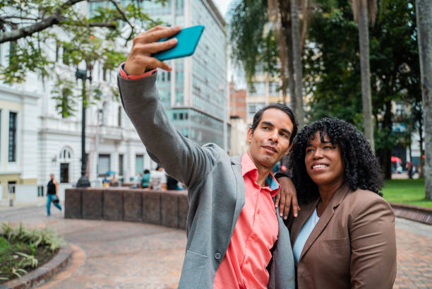 istock Coworkers taking a selfie in the city 2183684477
