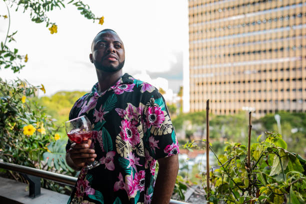 istock Young man relaxing in a rooftop restaurant 2183684934