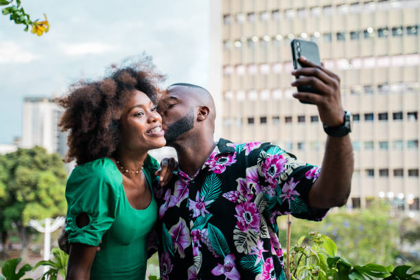 istock Couple taking a selfie in the restaurant at rooftop 2183685159