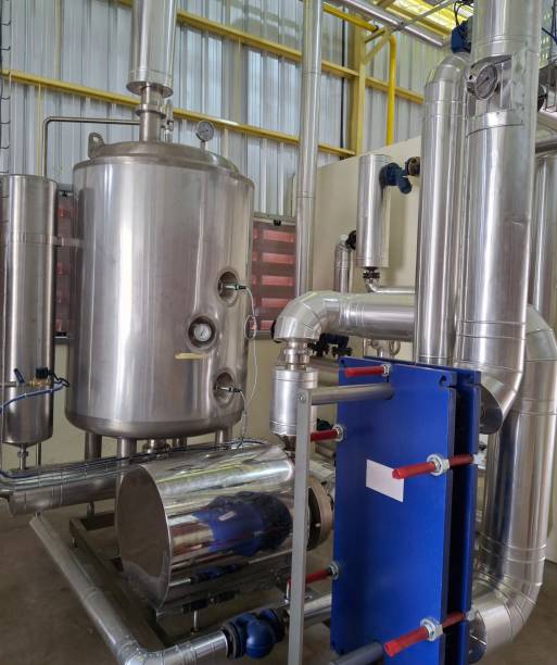 istock piping system, pressurized stainless steel tank in industrial area 2183687561