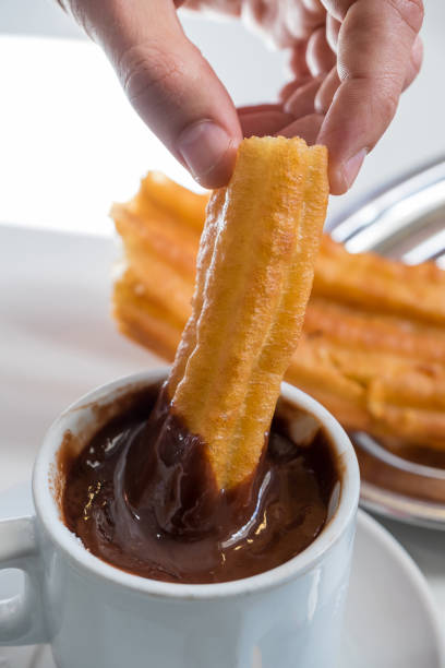 istock Churros and a cup of chocolate 2183691700