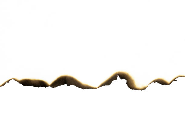 istock White paper burned edges isolated on white background with clipping path. 2183692340