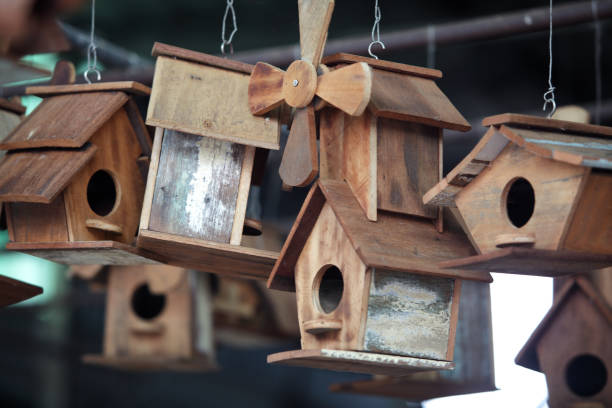 istock Charming Wooden Birdhouses Hanging for Display 2183696067