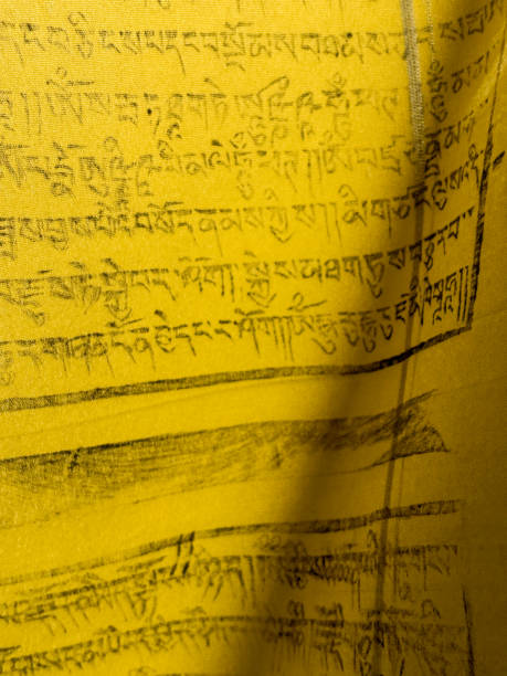istock A yellow piece of fabric with writing on it 2183696277