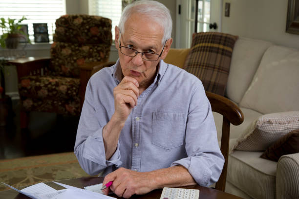 istock Senior man pissed about paying bills 2183704798
