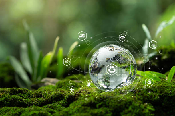 istock Green logistics management process related to the environmentally friendly transportation of goods.Sustainable transport and renewable energy.Crystal globe glass with green transportation icons. 2183705064