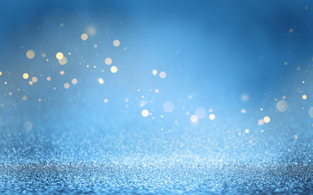 istock Shiny blue glitter texture background with blurred bokeh lights. Abstract festive background with soft focus. 2183710895