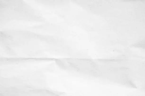 White recycled craft paper texture as background. Grey paper texture, Old vintage page or grunge vignette of old newspaper. Pattern rough art creased grunge letter. Hardboard with copy space for text. White recycled craft paper texture as background. Grey paper texture, Old vintage page or grunge vignette of old newspaper. Pattern rough art creased grunge letter. Hardboard with copy space for text.