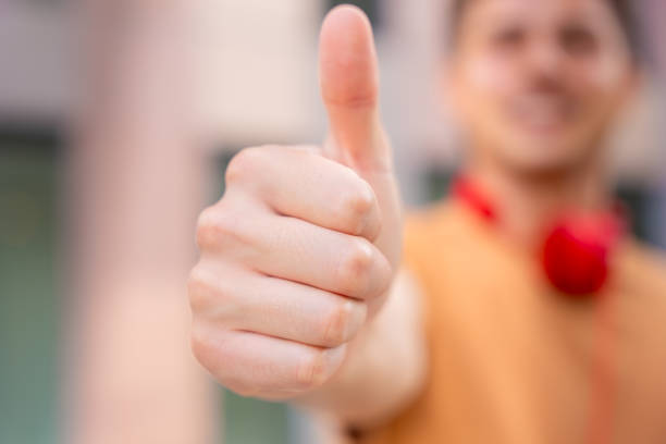 istock Thumbs Up Hand Gesture Showing Approval 2183714206