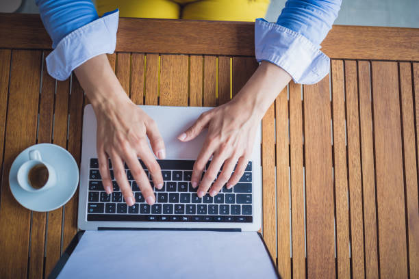 istock Working on Laptop with Coffee on Wooden Table 2183715646