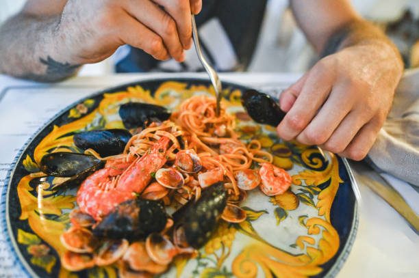 istock Eating seafood pasta at restaurant. 2183717773