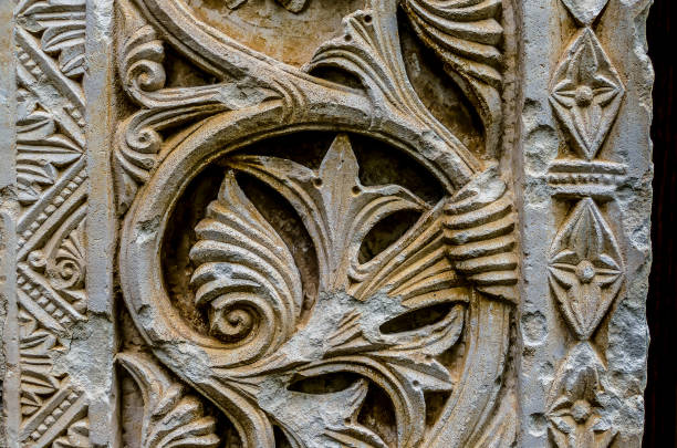 istock A stone carving of a flower with a spiral design 2183717896