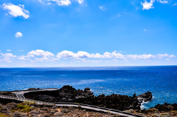 istock A beautiful blue ocean with a few clouds in the sky 2183717980