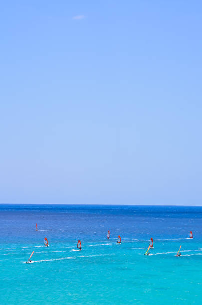 istock A group of people are windsurfing in the ocean 2183722831