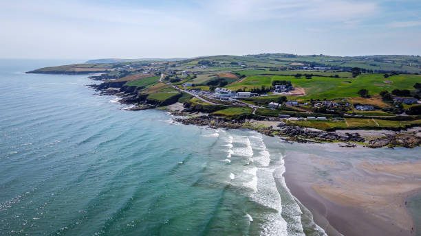 istock Seaside Irish landscape on a summer day, top view. Coastline with a beach. 2183723935