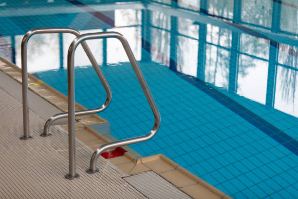 istock Modern Indoor Pool with Sleek Railing and Clear Blue Water 2183725862