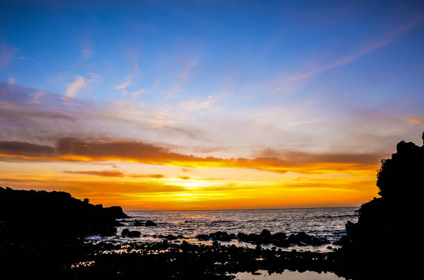 istock The sky is a beautiful orange color as the sun sets 2183729629