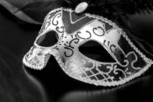 istock venice carnival mask, isolated from background, close up 2183730069