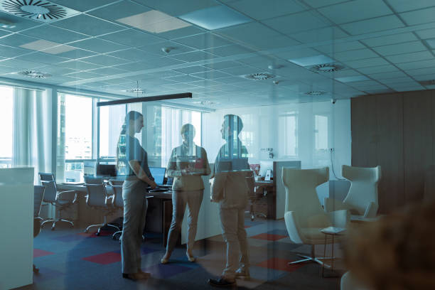 istock Office Team Meeting in Morning Light 2183730157