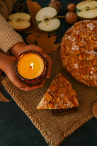 istock Candle and homemade apple pie, autumn mood 2183730838
