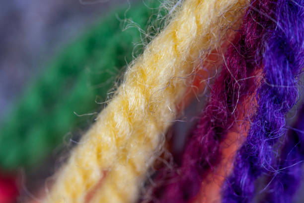 Colorful wool ropes macro photo.