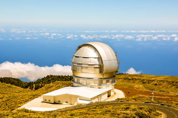 istock A large telescope is on a hill with a clear blue sky in the background 2183736501