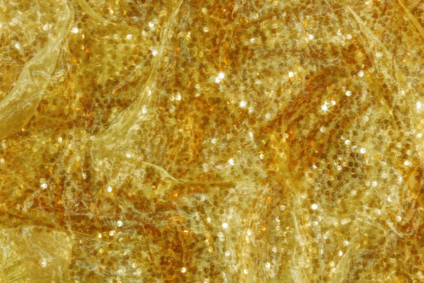 istock Sparkly golden festive background with sequins. 2183738566