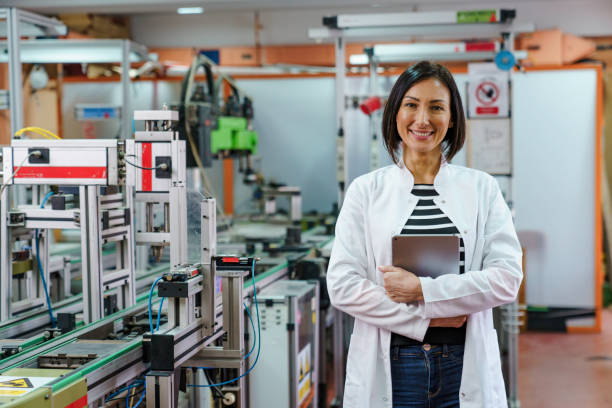 istock Confident Female Robotic Engineer with Tablet in Lab 2183739298