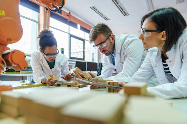 istock Diverse Team Engages in Robotic Innovation in Classroom 2183739434