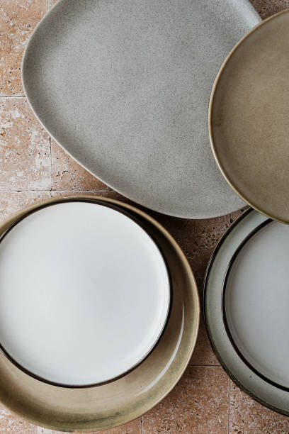 istock Top view of modern various ceramic plates on a kitchen table, cooking concept. 2183746795