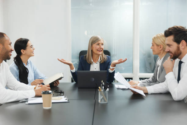 istock Lawyers working together at table in office 2183752760
