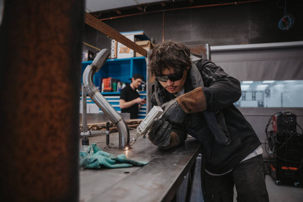 istock Metal worker using laser welder in factory 2183753279