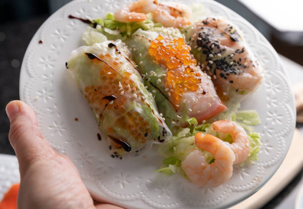istock Fresh Seafood Spring Rolls with Shrimp and Caviar Asian Fusion Appetizer. 2183756303