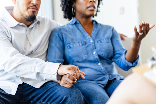 istock Woman gestures while talking to counselor 2183759210
