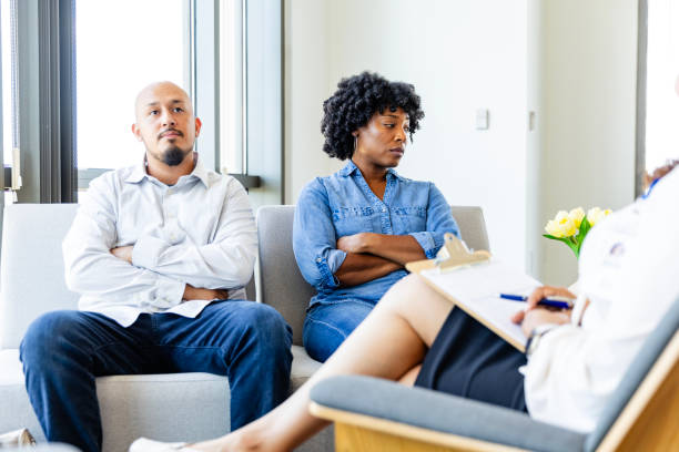 istock Couple ignore each other during counseling session 2183759213